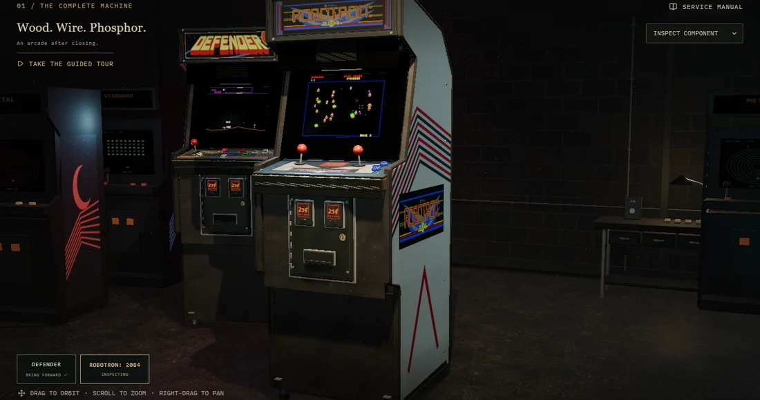Live exploded Defender exhibit with a detailed cabinet and autonomous space battle on its CRT